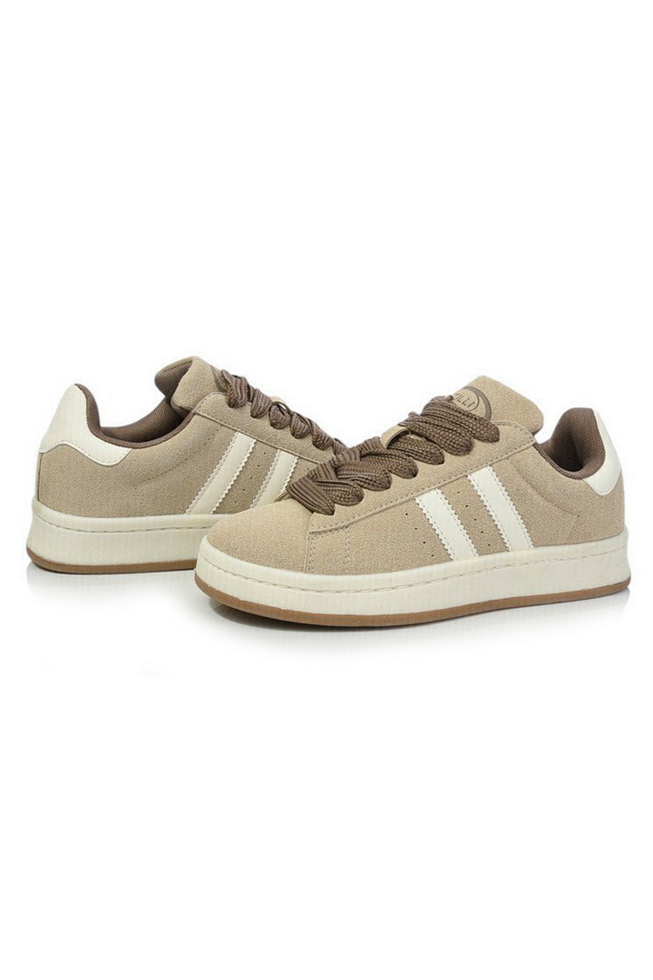 Кросівки жіночі